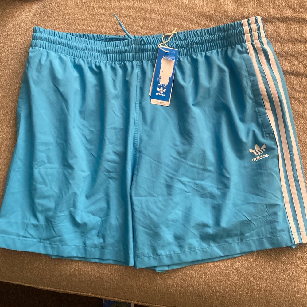 adidas Men’s Light Blue Athletic Shorts with White Stripes
